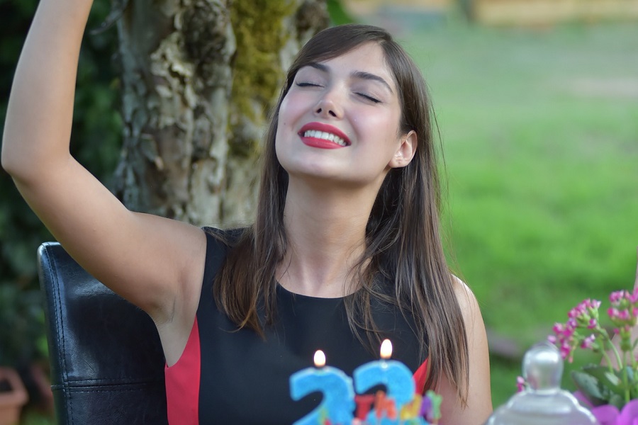 Best Backyard Games for Parties Close Up of a Woman Celebrating Her 22nd Birthday Outside
