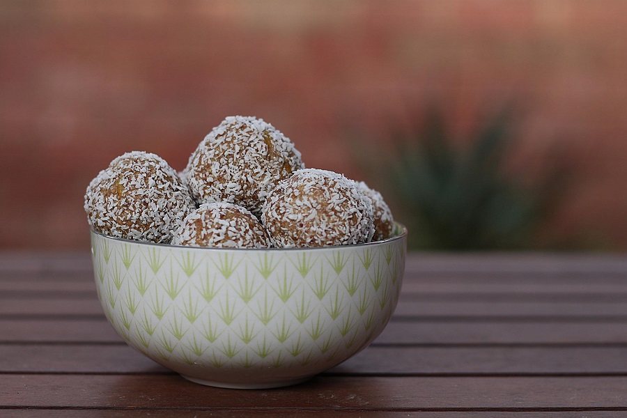 Snacks for Weight Loss to Carry with You a Small Bowl Overflowing with Protein Balls