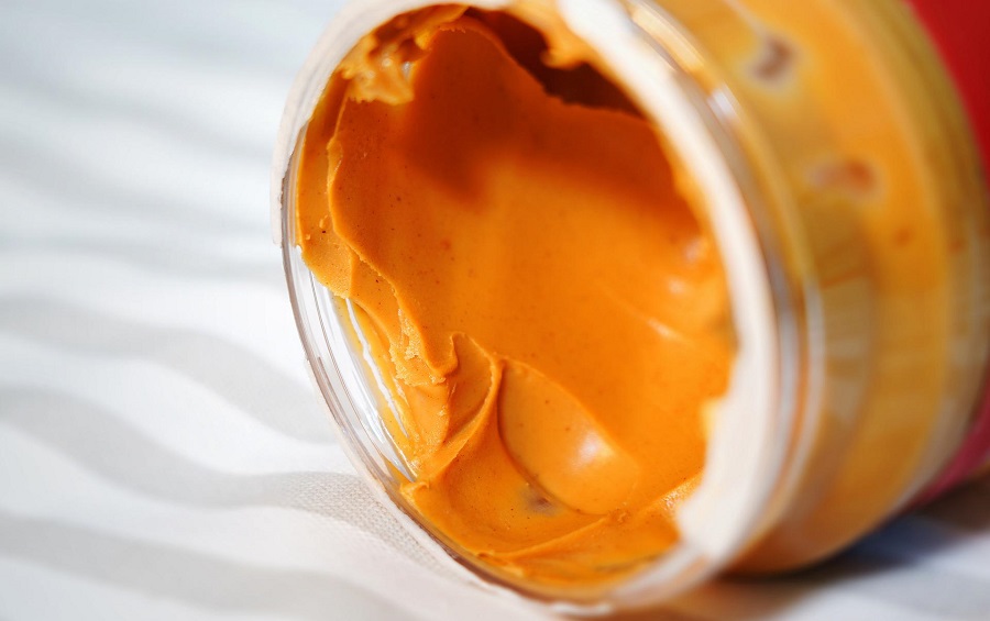 Snacks for Weight Loss to Carry with You Close Up of a Jar of Peanut Butter Without a Lid