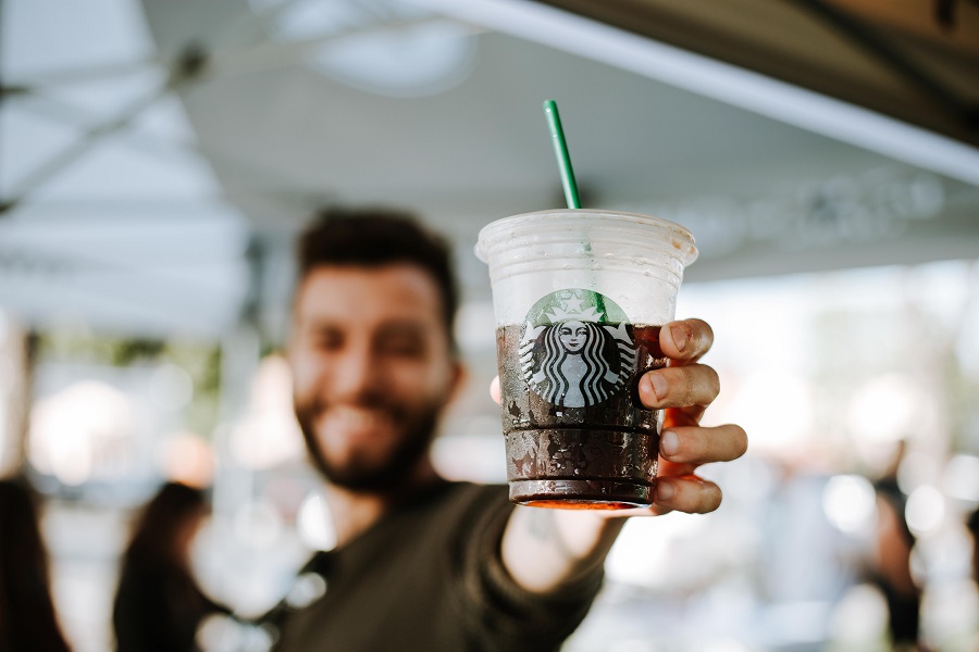 Starbucks Copycat Drink Recipes for Travel Man Holding a Starbucks Cup