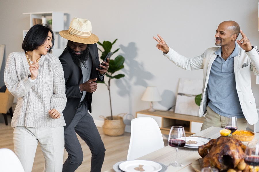 Thanksgiving Appetizers People Dancing at a Thanksgiving Dinner Party