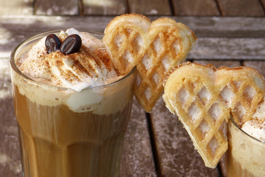 Starbucks Iced Coffee Close Up of Two Glasses with Iced Coffee and Waffle Hearts