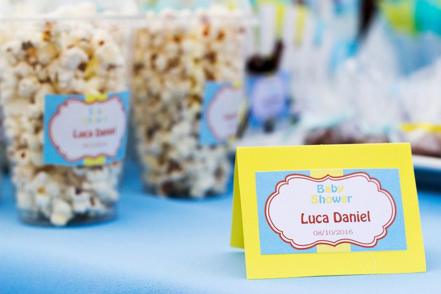 Baby Boy Gift Ideas Close Up of a Snack Table at a Baby Shower with The Baby's Name Written on a Sign