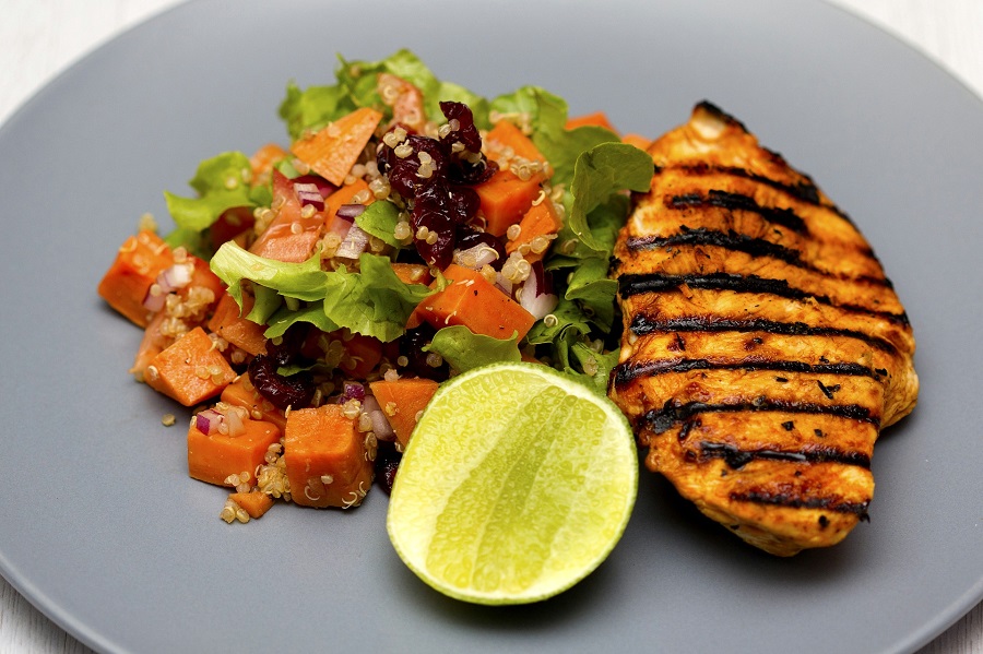 Clean Eating Recipes with Chicken Close Up of a Chicken Dinner with a Salad and a Sliced Lime