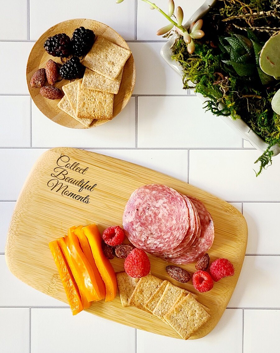 Personalized Gifts for Mom Overhead View of a Mini Charcuterie Board with Assorted Foods on it