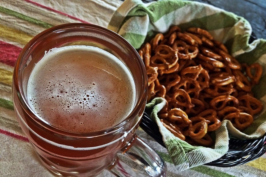Beer Dip for Pretzels Overhead View of a Cup of Beer and a Bowl of Pretzels