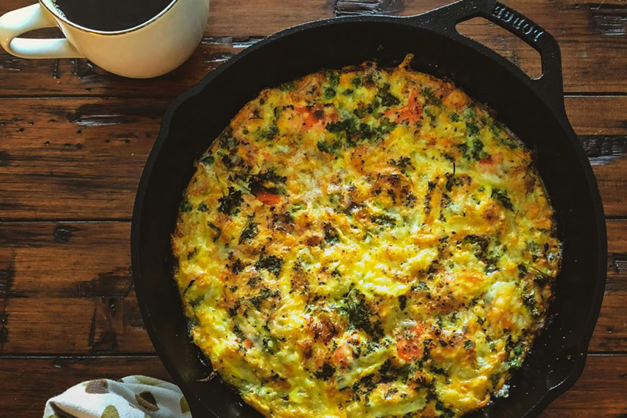 Clean Eating Breakfast Recipes an Egg Frittata Cooking in a Cast Iron Skillet