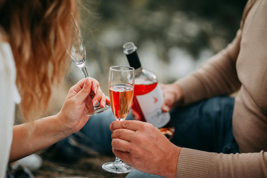 Sexy Valentine's Day Nail Ideas a Couple at a Picnic with Wine