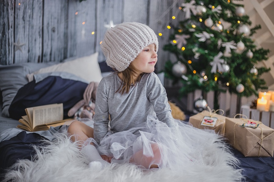 Bullet Journal Holiday Planning Layouts a Young Girl Waking From Bed with a Christmas Tree in the Background