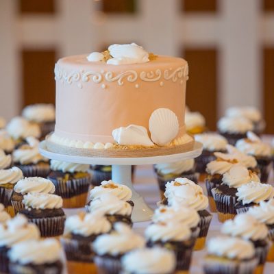 Cupcake cakes for a wedding can be as customized as any of the best wedding cakes can be and they are even easier to share with the entire party. Cupcake Wedding Cake Stand | Wedding Cakes with Cupcakes on Tiers | Wedding Cake with Cupcakes Around It | Cupcake Wedding Dress Cake | Cupcake Wedding Cake Blue