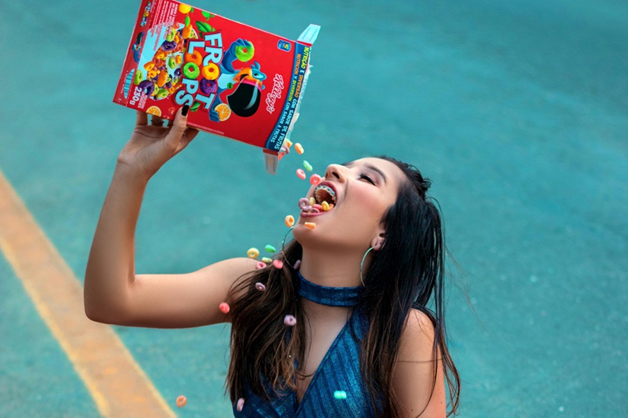 Be a Fruit Loop in a World of Cheerios Inspiration a Woman Sitting on the Ground Pouring a Box of Fruit Loops into Her Mouth