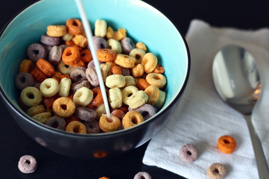 Be a Fruit Loop in a World of Cheerios Inspiration Close Up of a Bowl of Fruit Loops with Milk Pouring In