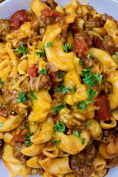 Pressure Cooker Beef Goulash Recipe in a bowl with bread