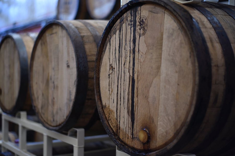 Wine Etiquette Tips Close Up of Wine Barrels