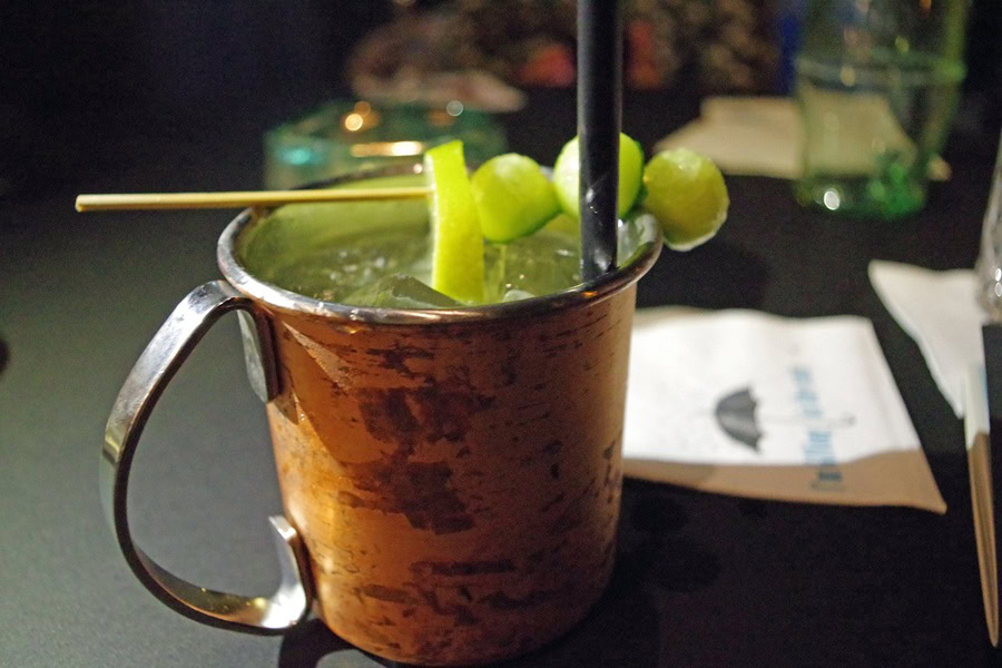 Best Things to Know About Moscow Mules Close Up of a Moscow Mule Garnished with Lime and Grapes