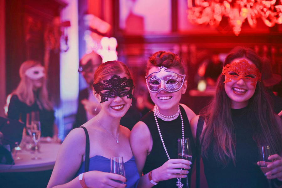 Halloween Party Recipes a Group of Women Wearing Masquerade Masks at a Party