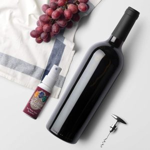 Wine Away Stain Remover On a Countertop with a Wine Bottle and Corkscrew