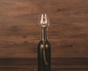 Transform your empty bottle of wine into a romantic, soft glowing hurricane bottle lamp. This glass chimney is elegant looking and makes for a great gift for wine lovers. Wine DIY Crafts | Wine Bottle DIY Crafts | DIY Wine Bottle Ideas | Romantic Dinner Tips | Date Night Ideas | DIY Home Décor | Date Night Tips #wine #DIY