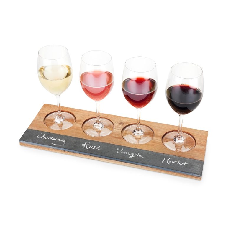 Wine Flight Board with Wine Glasses on it and Names of Wine Written on Slate