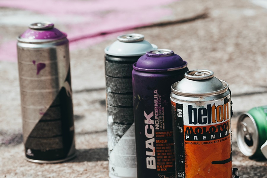 Best Netflix Series for Teens Close Up of an Assortment of Spray Paint Cans