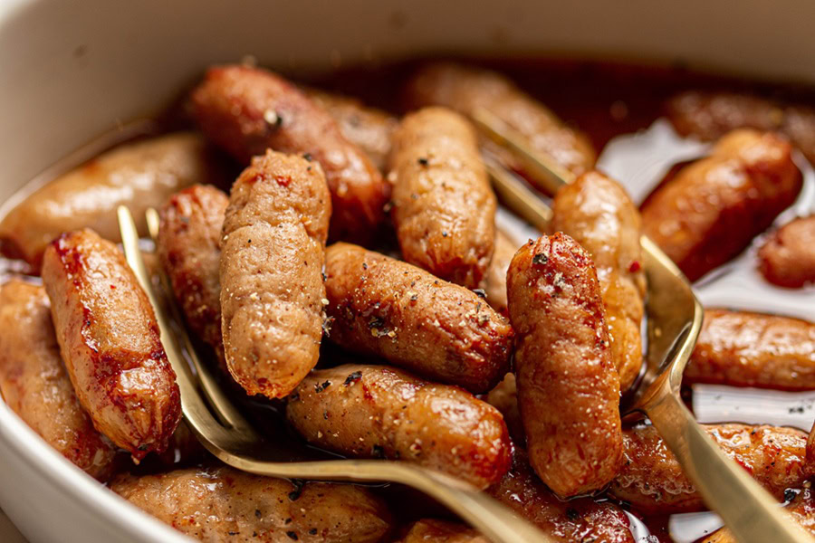 Crockpot Little Smokies Party Food Recipes Close Up of Grape Jelly BBQ Sauce Little Smokies
