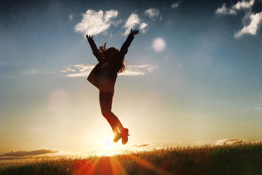 Best Inspirational Quotes About Life  a Silhouette of a Person Jumping in the Air with the Sun Setting Behind Them