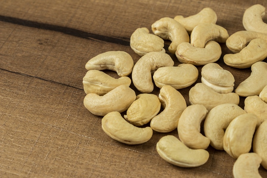 Grab and Go Quick Snacks Close Up of Cashews on a Wooden Table