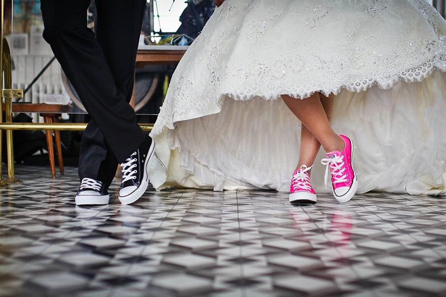 Photography Poses to Up your Photo Game View of a Couple's Feet Standing Together with The Woman in a Wedding Dress and The Man in a Tux