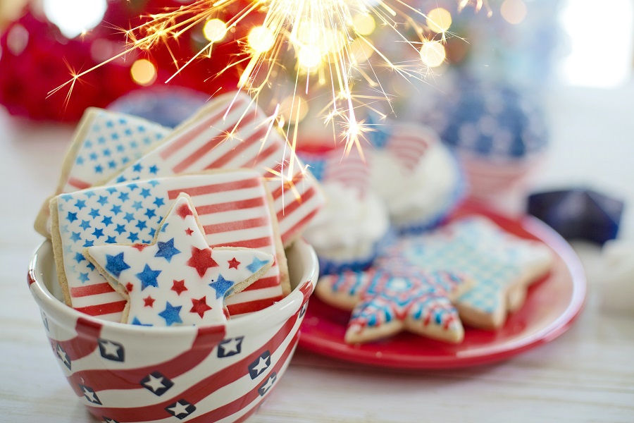 Fourth of July Facts to Know Close Up of Fourth of July Cookies with a Sparkler