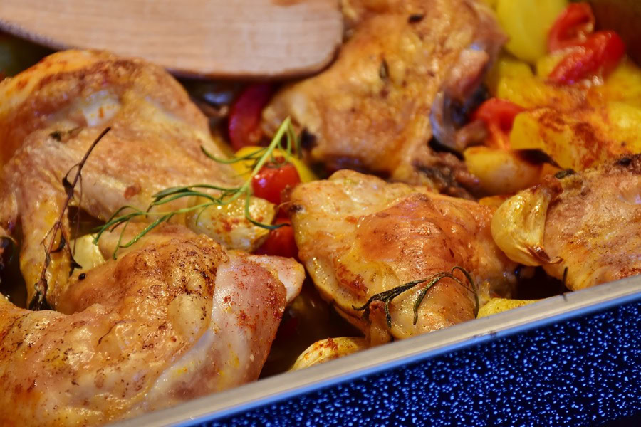 Best Healthy Ways to Cook Chicken Close Up of Cooked Chicken in a Serving Dish