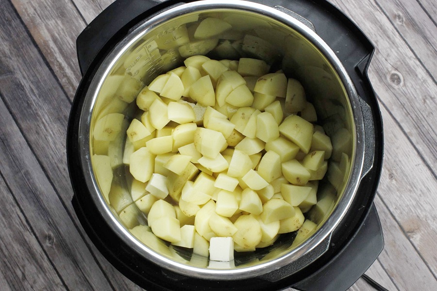 How to Use an Instant Pot Close Up of an Instant Pot Filled with Cubed Potatoes