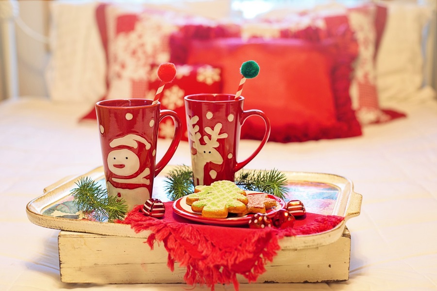 Holiday Cookie Recipes a Small Table with a Serving Tray with a Plate of Cookies and Two Small Coffee Mugs on Top