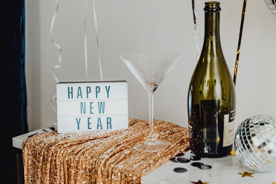 New Year's Eve Quotes Love Quotes for Couples Close Up of a Letterboard Sign That Says Happy New Year Next to a Bottle of Champagne and a Martini Glass