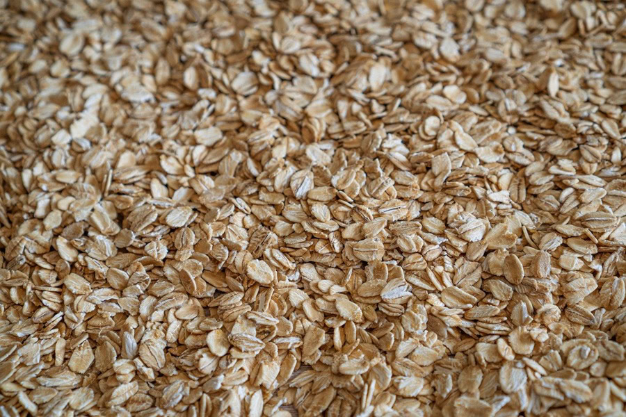 Savory Oatmeal Recipes Close Up of a Sheet Pan Covered in Oats