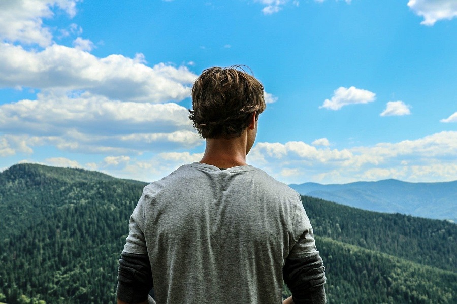 Quotes About New Beginnings After Divorce Man Looking at Mountains During a Hike
