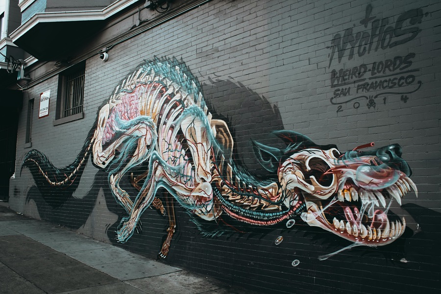 Unique Bars in San Francisco Graffiti Art in San Francisco of a Dog's Skeleton Running