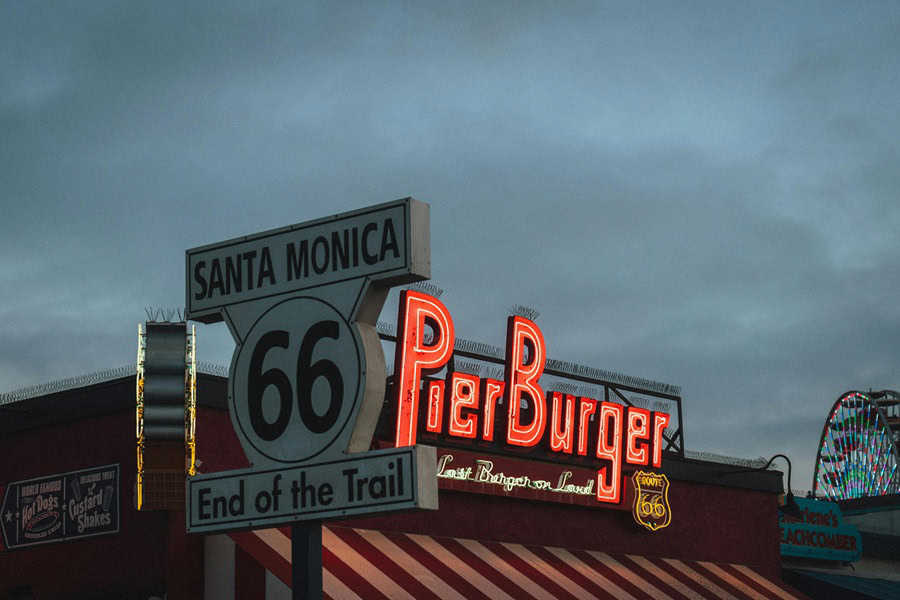 Best Tourist Things to Do in LA View of the Historic Road Signs on Santa Monica Pier