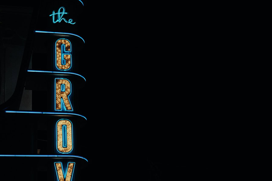 Best Tourist Things to Do in LA Close Up of The Grove Neon Sign at Night