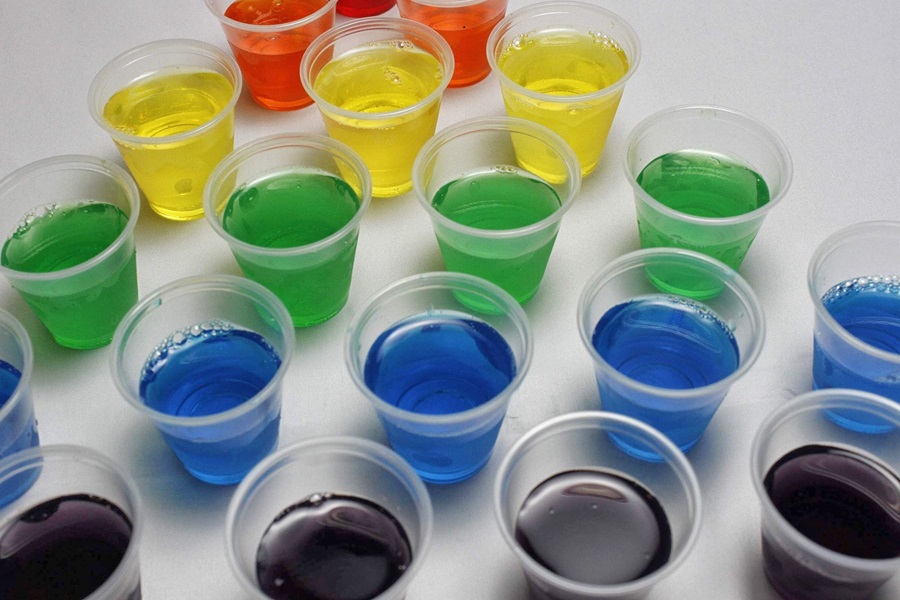 How Long Does it Take Jello Shots to Set a Collection of Jello Shots in Different Colors on a White Surface