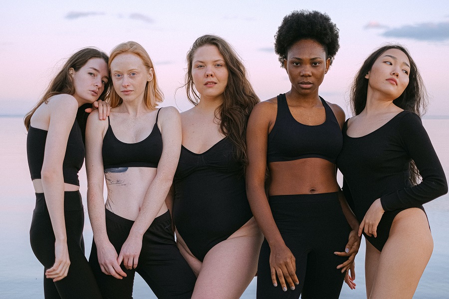 Quotes About Body Positivity a Group of Women Standing Together of All Different Sizes and Body Types
