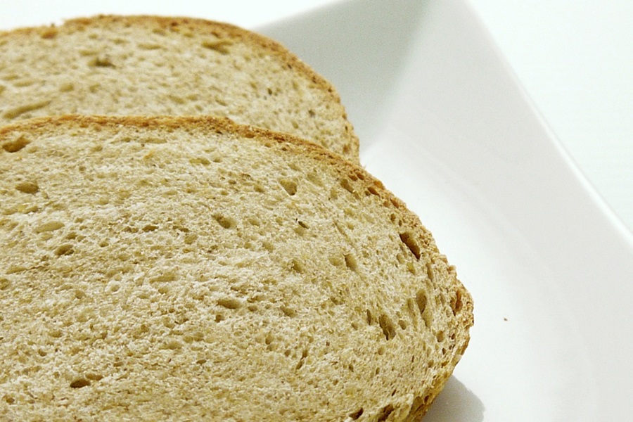 Gluten Free Beer Bread Recipes Two Slices of bread on a White Plate
