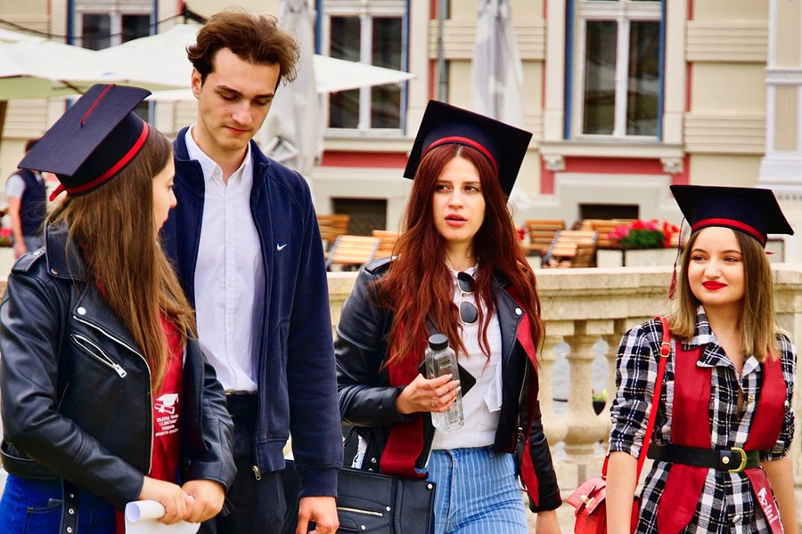 High School Graduation Party Foods a Group of Teens Walking Around Campus with Their Graduation Caps On