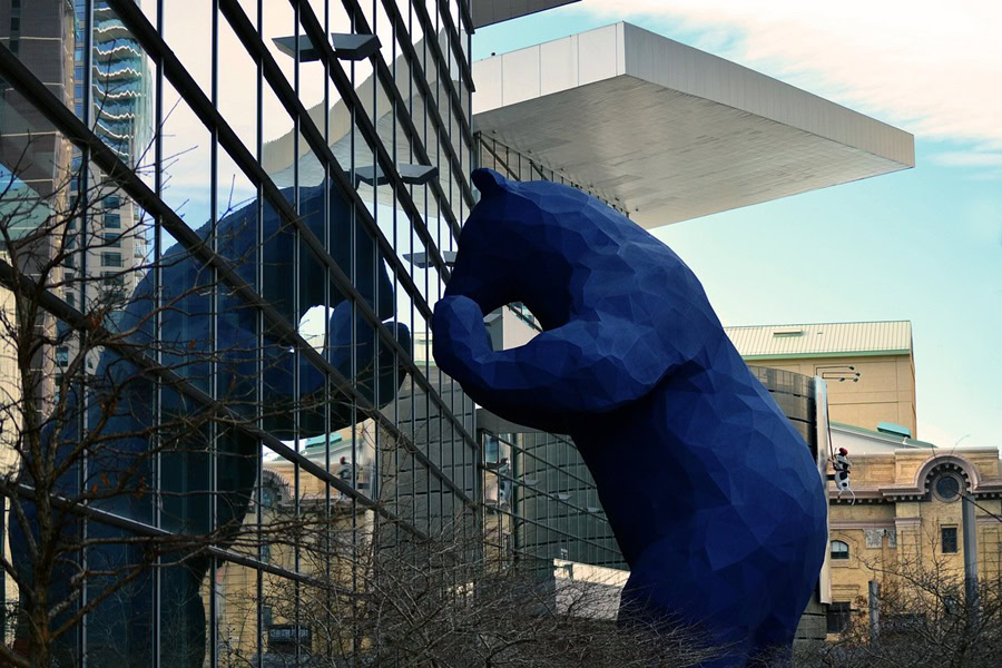 Free Things to do in Denver for Kids a Giant Blue Bear Statue Looking in Through a Window of a City Building in Denver