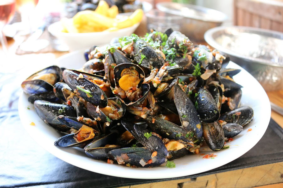 7 Things to do in Delray Beach During the Day or Night Close Up of a Plate of Mussels 