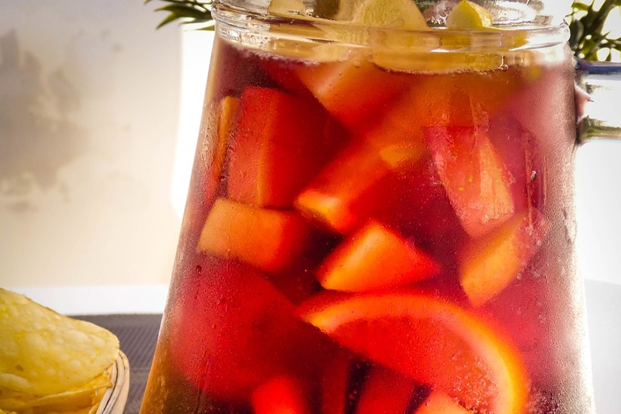 Best Sangria Recipes to Sip on During Close Up of a Pitcher of Sangria with Fruit