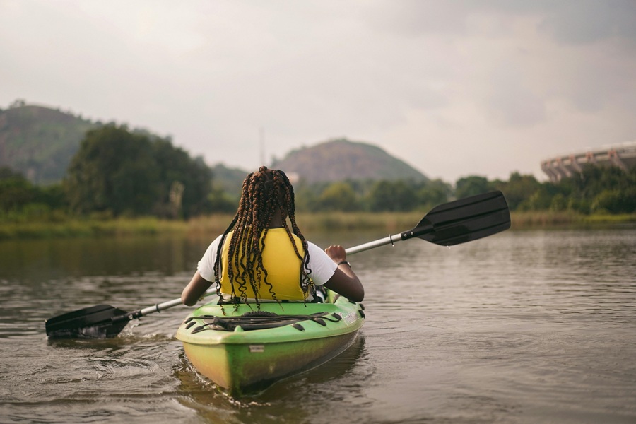 Best Things to do in San Diego a Woman Kayaking Out on Water