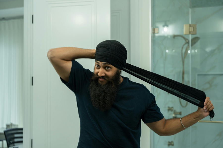 How to Start Your Day a Man Getting Dressed in His Bathroom