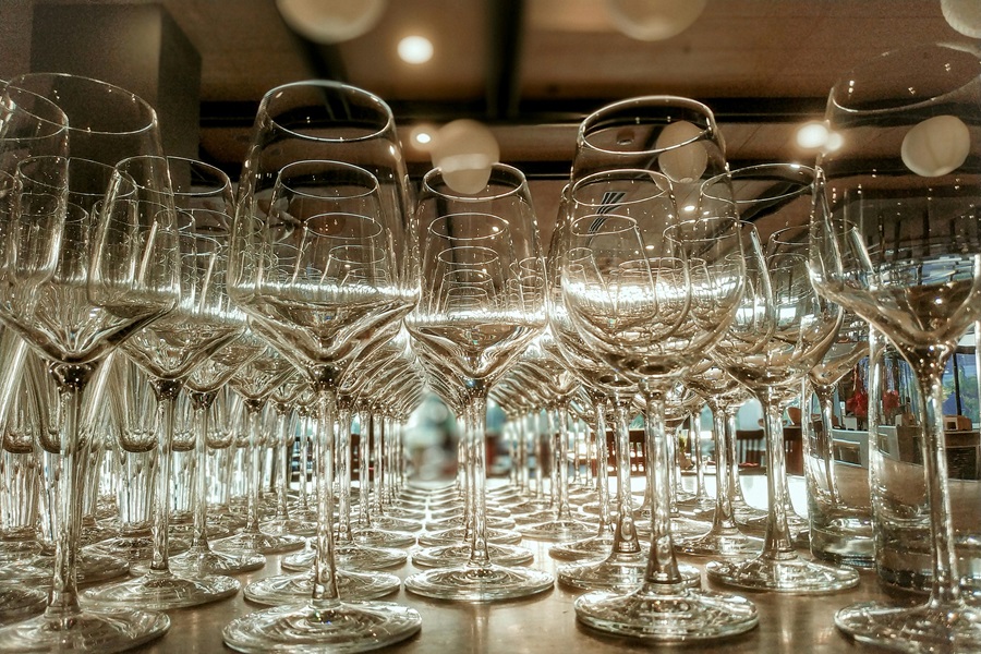 24 Wine Tasting Rooms in Downtown Napa Close Up of Empty Wine Glasses on a Table