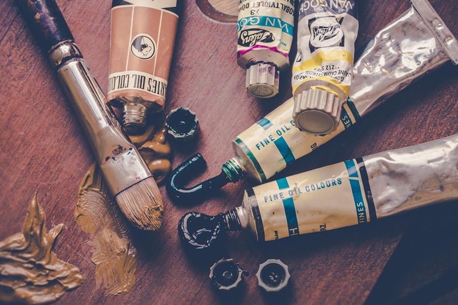 Free Things to do in Orange County Paint Tubes with Thick Paint Coming From Each One on a Wooden Table