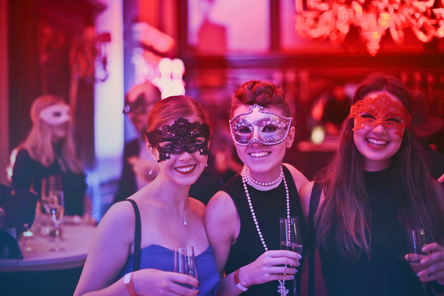 Halloween Party Aesthetic Ideas Two Women Wearing Masks at a Halloween Party